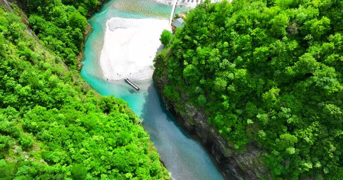 Aerial video of Shala river and its clear blue waters with lush forests in northern Albania. 
