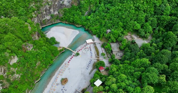 Aerial video of Shala river and its clear blue waters with lush forests in northern Albania. 