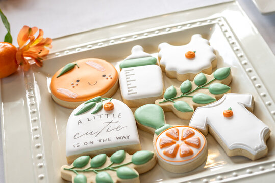 Plate of decorated cookies for a baby shower