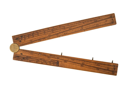 ancient wooden ruler on white, isolated