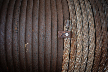 old and vintage iron cable on spool .