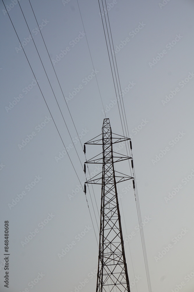 Poster high voltage electricity transmission tower with the copy space, electricity distribution pylon unde