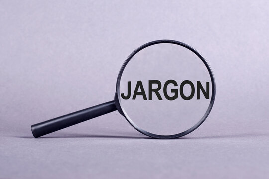 A magnifying glass hovering above the word jargon, highlighting the intricate details of the text.