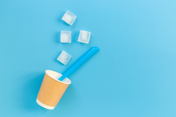 Recyclable coffee paper cup with ice. Cold drink concept