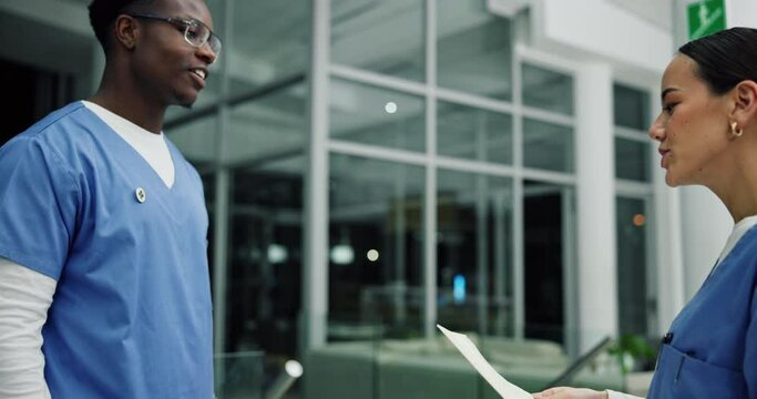 Nursing staff, handshake and teamwork with medical record in hospital for healthcare as professional in ER. Woman, man and greeting for collaboration, meeting or debrief in clinic with paperwork