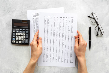 Naklejka premium Financial paperwork. Calculating commercial costs pay invoices bills