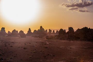 Moon landscape of limestone chimneys geological rock formations in a sunset rays at the bottom of...