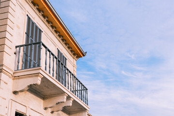 Cute and bohemian blue old balcony facade, wood windows in Nicosia