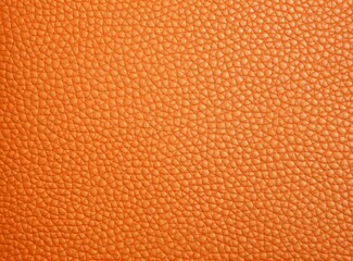 Close-up leather with a smooth, slightly uneven texture.