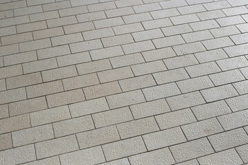 Brown tile floor walkway.Tiled courtyard
