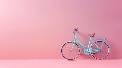 Fototapeta premium Blue bicycle on pink background