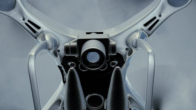 A quadcopter military drone dropping two bombs after detecting a target with the camera