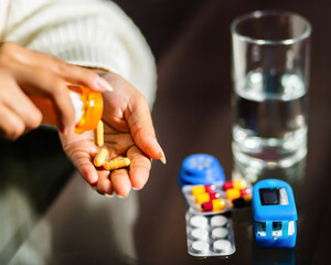 Close-Up of a Woman's Hands with Medicine