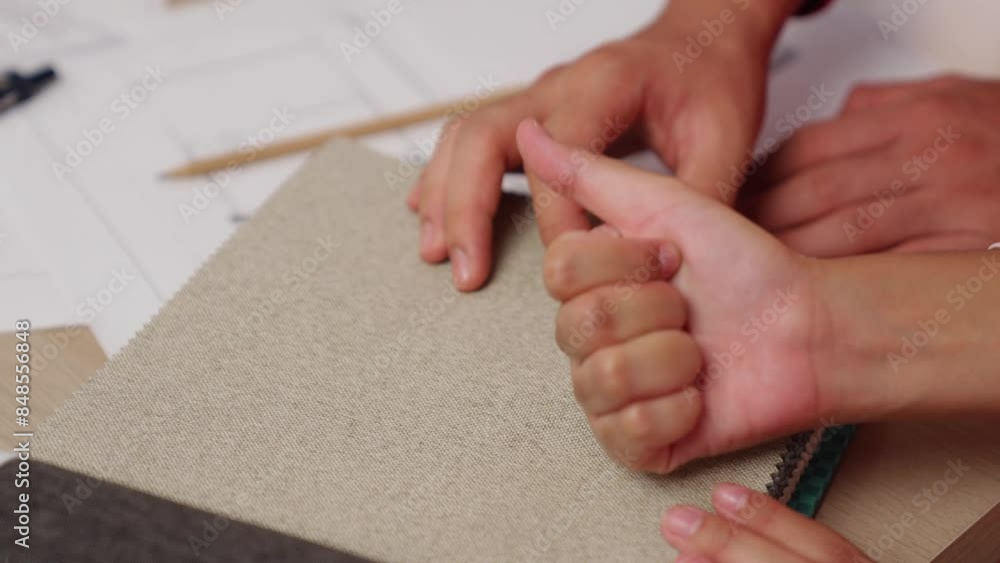 Poster slow motion hand closeup architect and interior designer presenting textile material and color from 