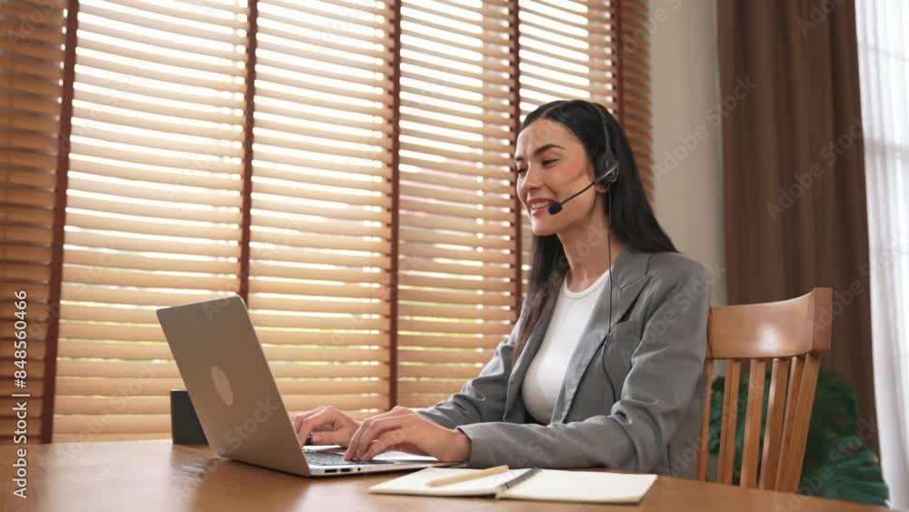 Aufkleber female call center operator or customer service helpdesk staff working on workspace while talking on