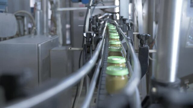 baby food production line in glass jars. baby puree production conveyor