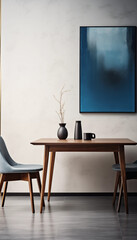 Walnut wood dining table with blue vase and cup on top of it with a blue painting on the wall behind it