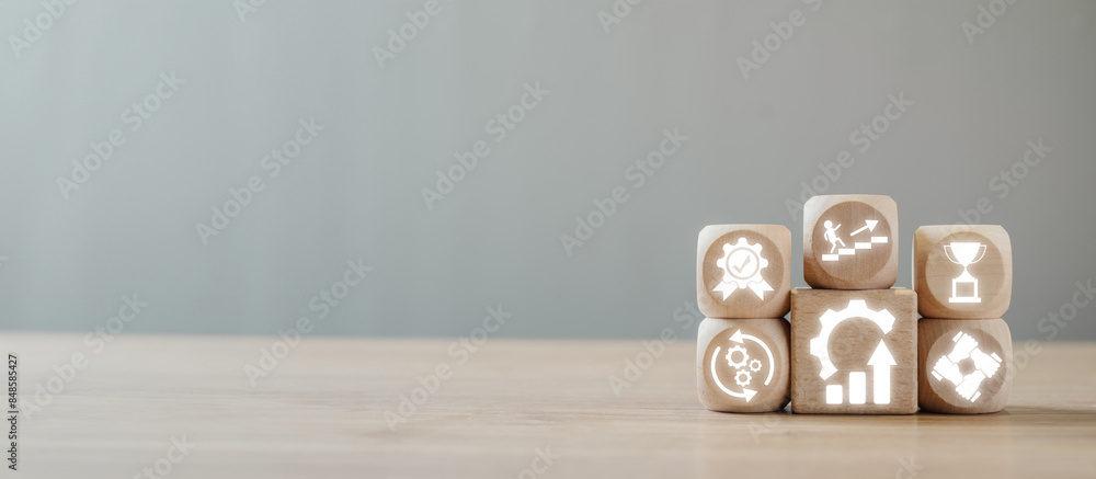 Poster wooden blocks with icons symbolizing the kaizen concept of continuous improvement, efficiency, and p