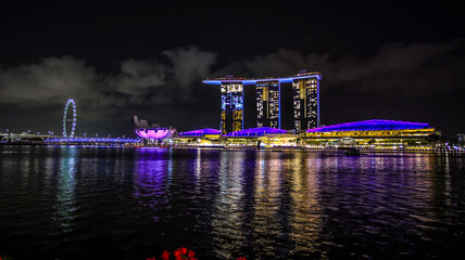 Singapore, Singapore - June 8 2024: Night scene at Marina Bay, a busy tourist spot in Singapore
