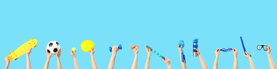 Collage of hands holding sports equipment on light blue background