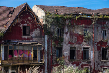 An old abandoned construction on the outskirts of Bilbao, on the Nervion River.  Basque Country
