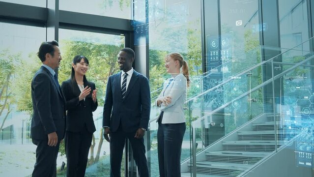 Multinational business people talking in the lobby and digital technology concept