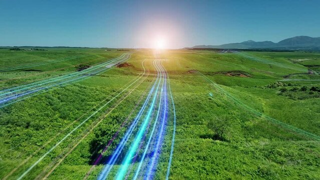 A band of light running across the grassland. A road leading to the future.