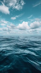 Fototapeta premium Ocean horizon: A wide view of the ocean meeting the sky at the horizon, perfect for overlaying text.