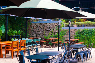tables and benches in the outdoor cafe