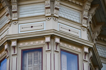 Historical Victorian home, detailed molding around windows.