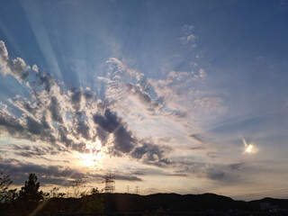 Dark mountain silhouette and sunset sky.