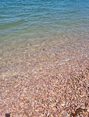 
It is a beach with round pebbles.