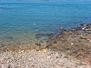 It is a beach with pebbles.