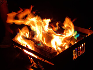 
It is a flame rising from a bonfire.