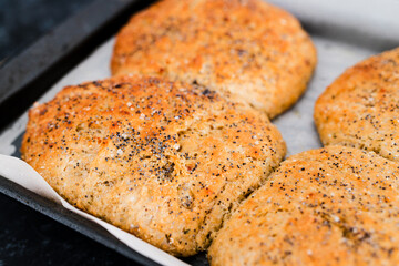 homemade bread rolls with poppy seeds