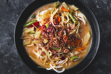 vegetarian rice noodle ramen with mixed veggies and fried shallots