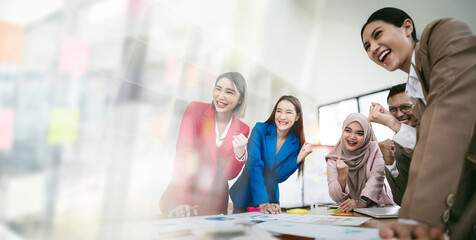 Group of Asian team creative business people Happy to be successful partnership teamwork at office.