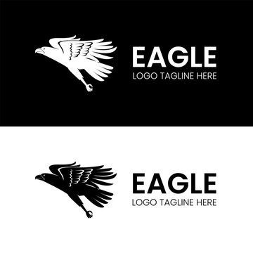 Flying Eagle silhouette with spread wings and claw for powerful and visionary flight company logo design