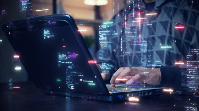 A software development designer or programmer is typing on a computer to create an application using an abstract code language in simulation. Digital cyber security technology concept.