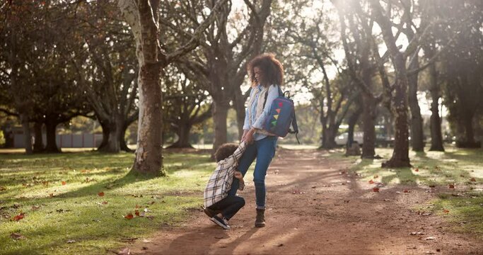 Mother, child and angry for school outdoor with tantrum, struggle and fighting in the park with backpack. Family, woman and son with behavior problem for preschool in forest with conflict and stress