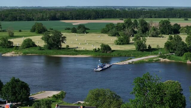 Ferry crossing the river elbe near barby saxony-anhalt - camera moving from left to right