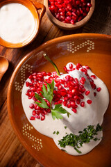 Chiles en Nogada, Typical dish from Mexico. Prepared with poblano chili stuffed with meat and fruits and covered with a walnut sauce. Named as the quintessential Mexican dish for national holidays.