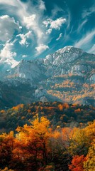 Majestic Autumn Mountain Landscape with Vibrant Foliage and Crisp Blue Sky