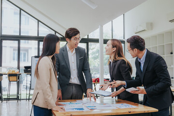 business related meeting Asian Business Team Discusses Strategy for Starting a Financial Process Analysis Project Successful Asian businessman working on a plan