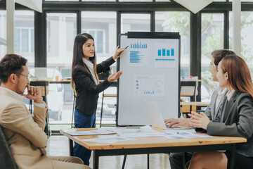 business related meeting Asian Business Team Discusses Strategy for Starting a Financial Process Analysis Project Successful Asian businessman working on a plan