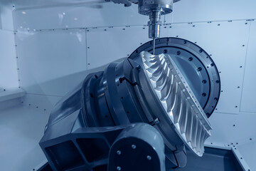 Producing turbine wheel and blades part with CNC drill machine five axis lathe. Concept modern...