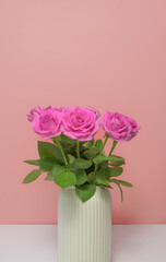 The roses are arranged in a way that they are all facing the same direction, creating a sense of harmony and balance.