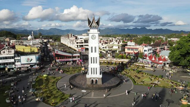Aerial view of Jam Gadang, a historical and most famous landmark in Bukit Tinggi City, West Sumatera, Indonesia. An icon of the city and the most visited tourist destination by tourists.