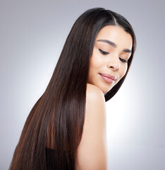 Fototapeta premium Haircare, pride and woman with beauty in studio for healthy growth, keratin treatment or straight hairstyle aesthetic. Female person, wellness and collagen shine, cosmetics and white background