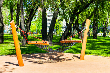Fototapeta premium hammock without people in a city park. utdoor hammock
